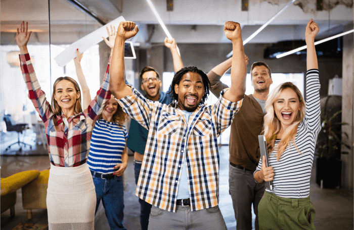 employees standing and cheering c